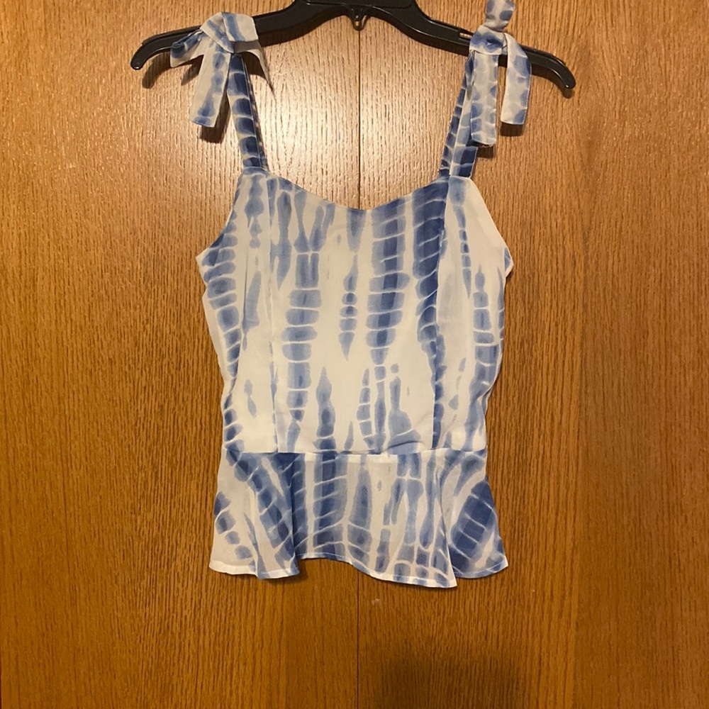 Size Small-White and blue spaghetti strap shirt with bows on straps.